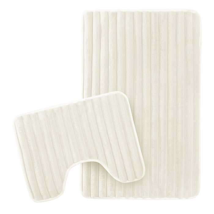 OLIVIA ROCCO 2-piece ribbed bath mat set in cream, featuring soft, non-slip, super absorbent fabric for bathroom comfort.