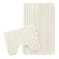 OLIVIA ROCCO 2-piece ribbed bath mat set in cream, featuring soft, non-slip, super absorbent fabric for bathroom comfort.