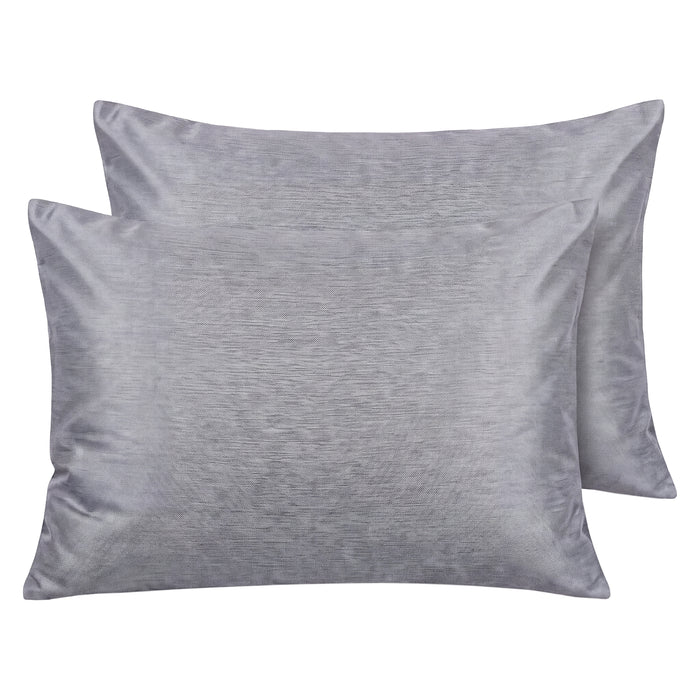 Pair of grey cooling pillowcases with a soft sheen