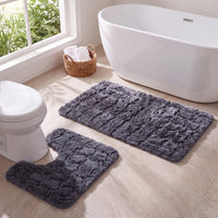 OLIVIA ROCCO 2-piece bath mat set with non-slip, super absorbent, quick-dry plush rugs in soft, luxurious fabric.