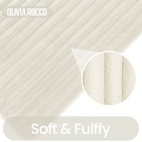 OLIVIA ROCCO 2-piece ribbed cream bath mat set with non-slip, super absorbent, and extra soft textures for bathroom comfort.