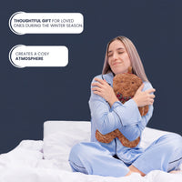 OLIVIA ROCCO gingerbread man hot water bottle with fluffy cover, 1L capacity, soft and cozy winter essential.
