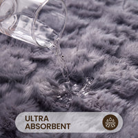 OLIVIA ROCCO 2-piece bath mat set with plush, non-slip, quick-dry, and super absorbent soft rugs for bathroom comfort.