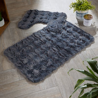 OLIVIA ROCCO 2-piece bath mat set with plush, quick-dry, non-slip bath rugs, featuring soft, absorbent fabric for bathroom comfort.