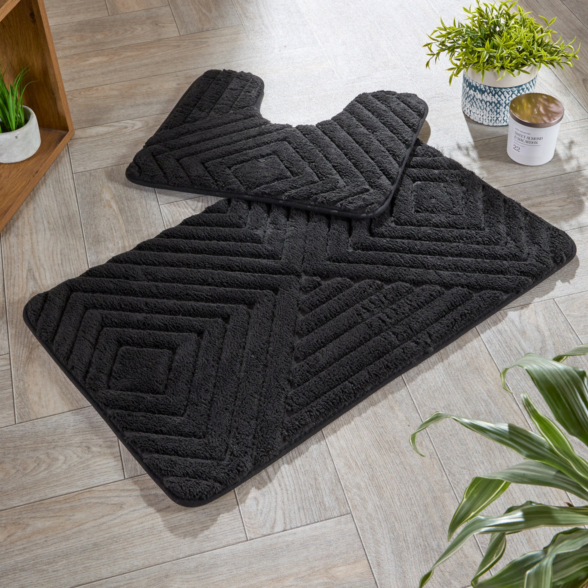 OLIVIA ROCCO diamond memory foam bathroom bath mat set with non-slip backing, featuring two soft, plush mats for bathroom comfort.